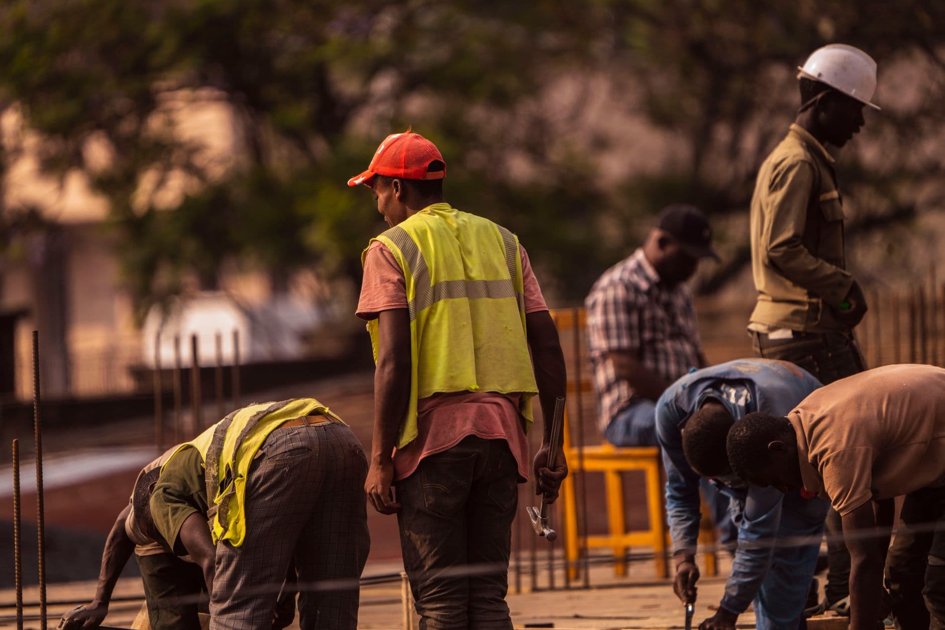 Construction workers on site in safety gear