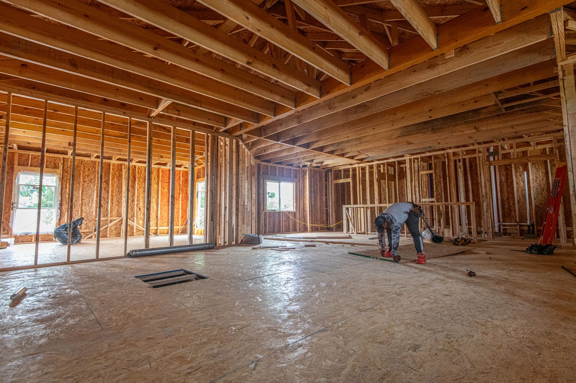 The interior of a house under construction, framing exposed